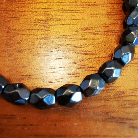 Stretch Faceted Hematite and Brushed Silver Tone Buddha Bracelet - Picture 9 of 12